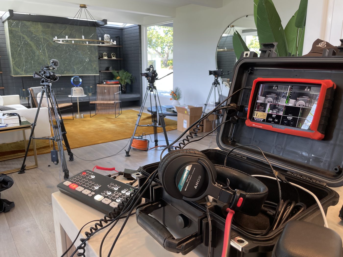 Multi-camera video production setup inside a home for a law firm interview